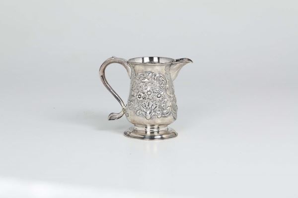 A jug in molten, embossed and chiselled silver, silversmith John Jobson, Newcastle 1770