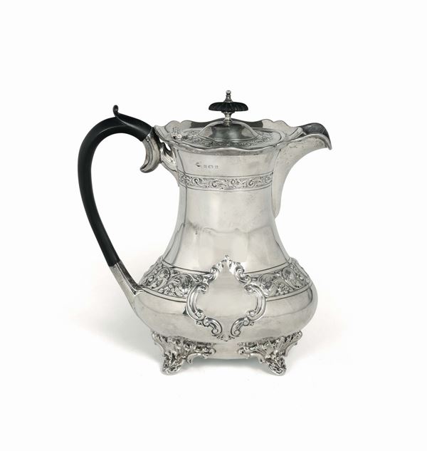 A teapot in molten, embossed and chiselled sterling silver. Birmingham 1830