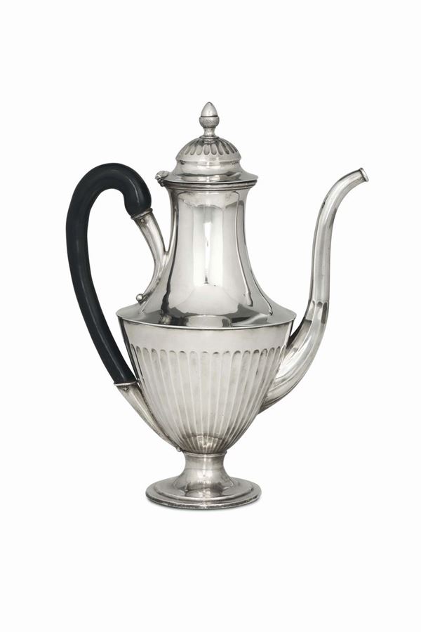 A coffee pot in embossed and chiselled silver, Genoa, Torretta stamp for the year 1805 and other illegible  [..]