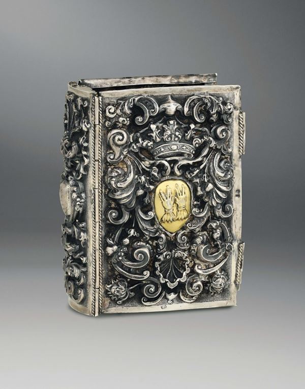 A Hebraic binding in molten, embossed, chiselled and gilded silver, Italian manufacture from the 18th  [..]
