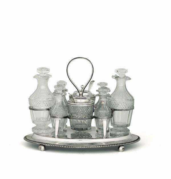 A cruet in molten, embossed and chiselled sterling silver, silversmith Charles Eley, London 1806 (teaspoons London 1826)
