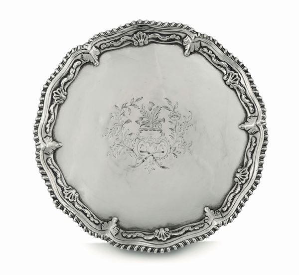 A salver in molten, embossed and chiselled sterling silver, London 1765, silversmith Robert Rew or Richard Rugg
