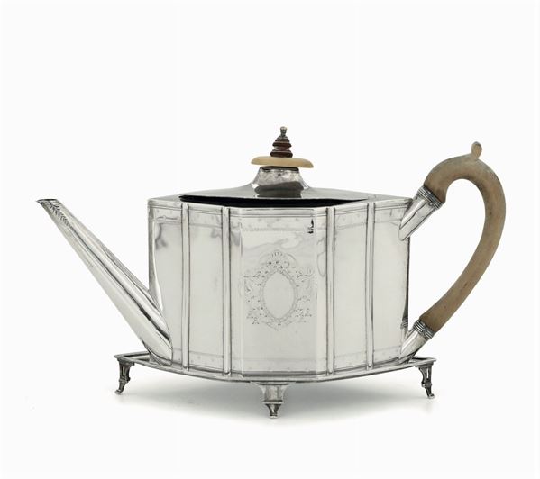 A teapot in silver sterling, molten, embossed and chiselled, wooden handle, London 1791, silversmiths Duncan Urquhart & Naphtale Hart.