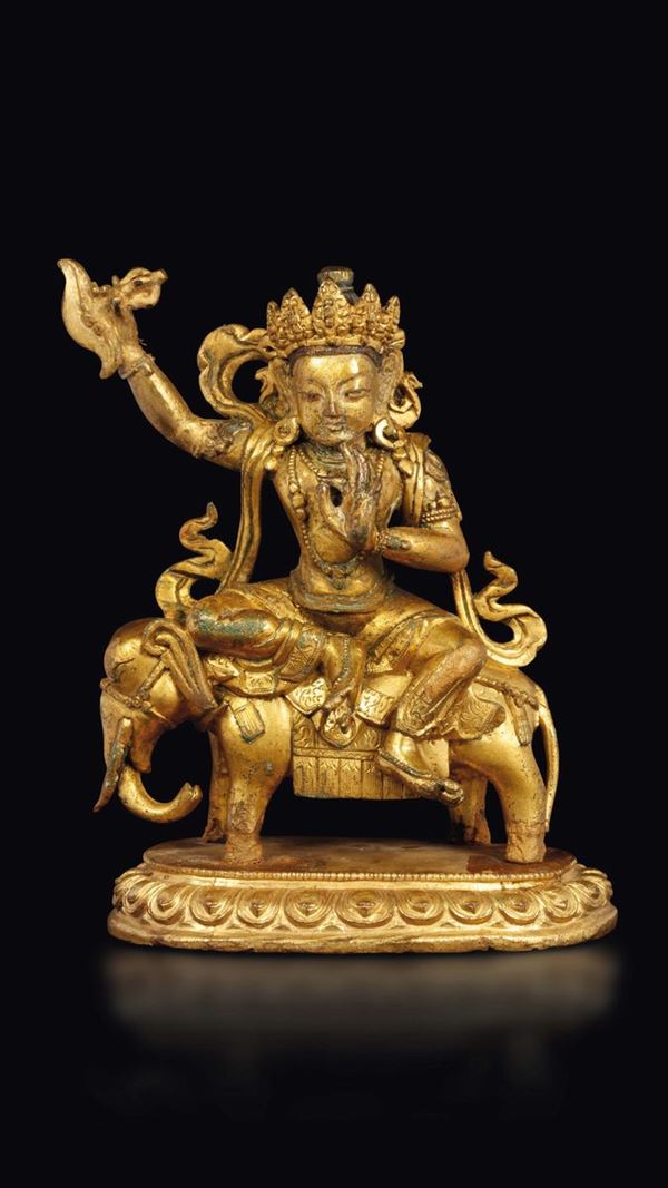 Figura di Samantabhadra in bronzo dorato con in mano karttrka seduto su elefante, Tibet, XVIII secolo