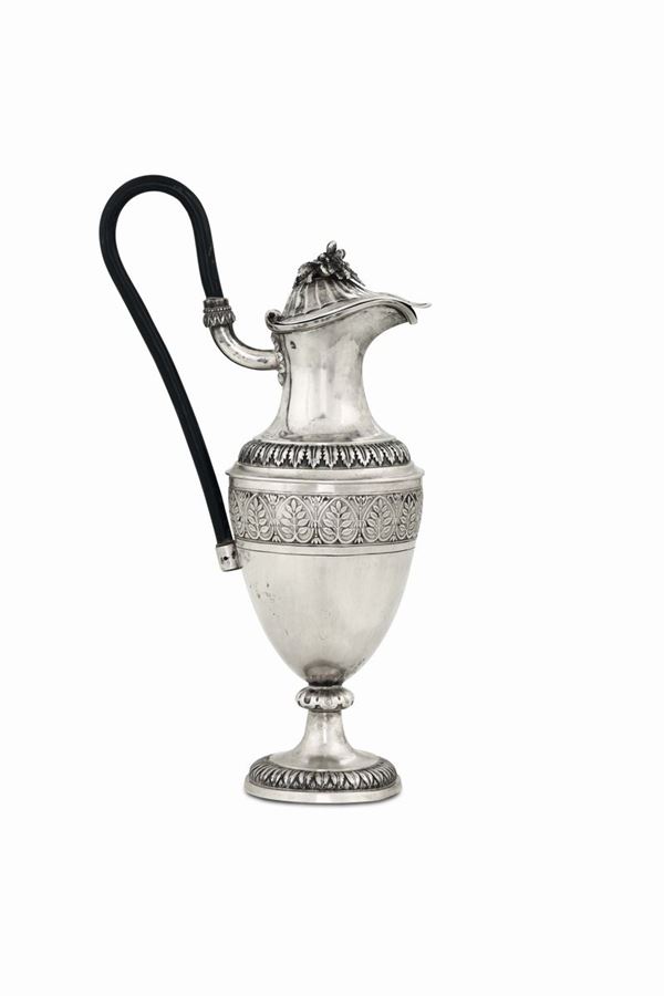 A spout in molten, embossed and chiselled silver, Germany (?) end of the 18th century.