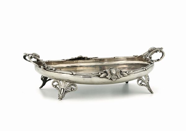 A centrepiece in molten, embossed and chiselled silver, Germany 20th century.