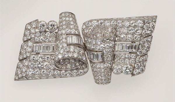 Diamond and platinum double-clip brooch. Trabert & Hoeffer Mauboussin N.Y.