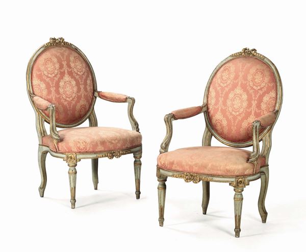 A pair of armchairs in carved, painted and gilded wood, Genoa, second half of the 18th century