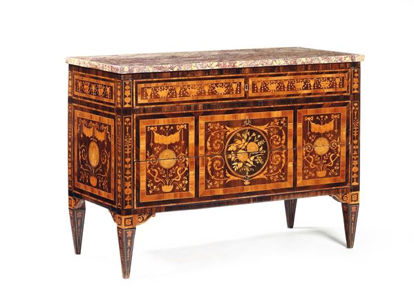 A Louis XVI chest, richly veneered and inlaid in various essences, in the style of Maggiolini, stamped with CN, Lombardy, end of the 18th century
