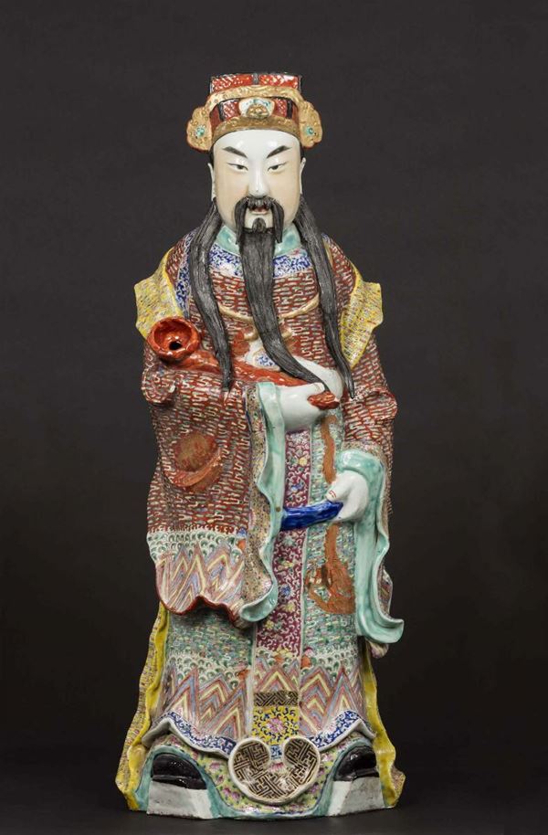 A figure of a dignitary with ruyi in polychrome porcelain, China, Qing Dynasty, 19th century