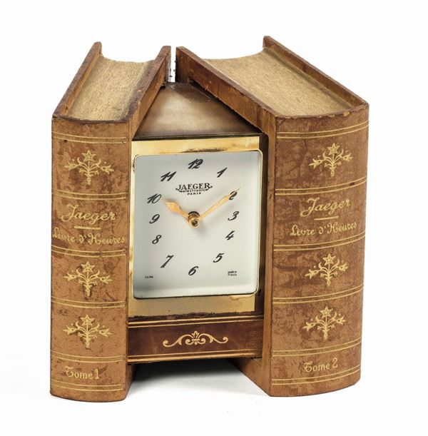 JAEGER, Paris. Livre d'Heures. Orologio da tavolo, elettromeccanico, a forma di libro.