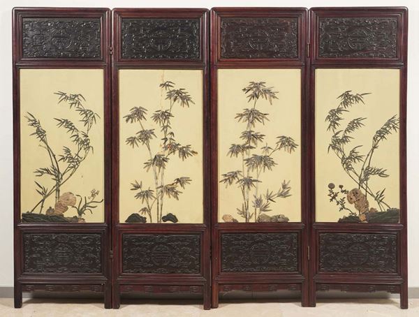 A four-fold screen in carved wood and panels with a naturalistic decor, China, Qing Dinasty, XIX cent [..]