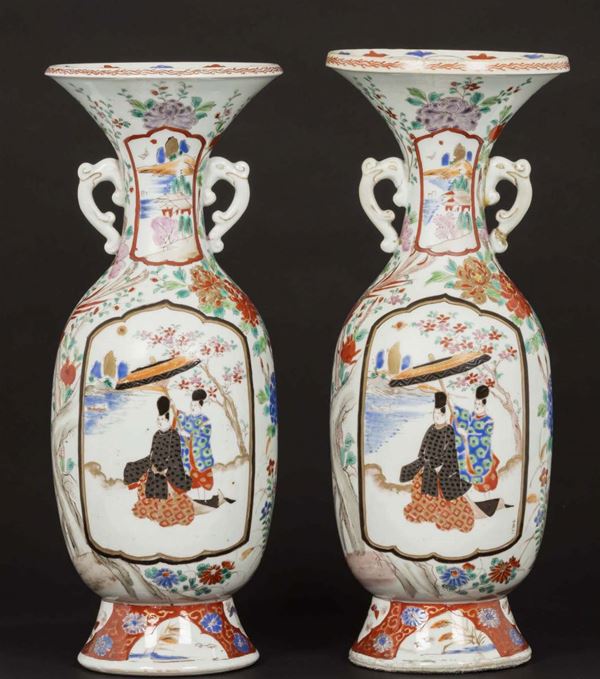 A pair of polychrome enamel vases with a figure of a dignitary, Japan, late 19th-early 20th century