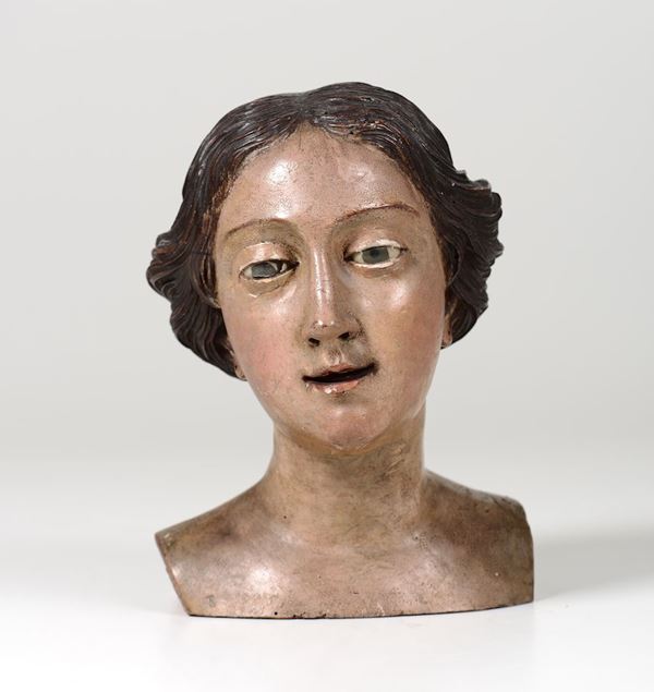 Testa femminile in legno scolpito e policromo, occhi in vetro. Scultore barocco italiano del XVIII secolo