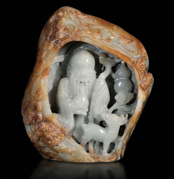 A carved jadeite group, China, 1900s