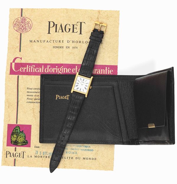 PIAGET - Elegante orologio da polso in oro giallo con numeri romani. Completo di scatola originale, garanzia e portafoglio Piaget.