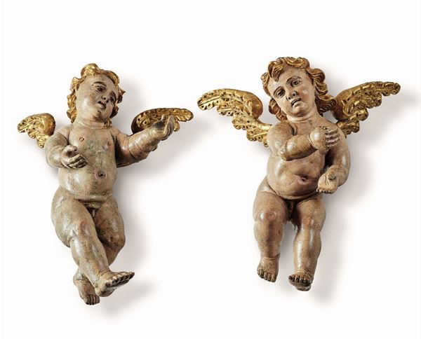 Two wooden putti, Central Italy, 1600s