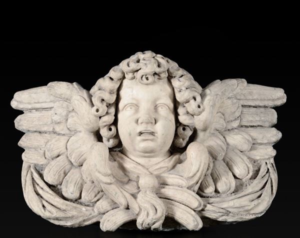 Monumentale testa di cherubino. Marmo bianco. Arte barocca genovese, inizi del XVII secolo