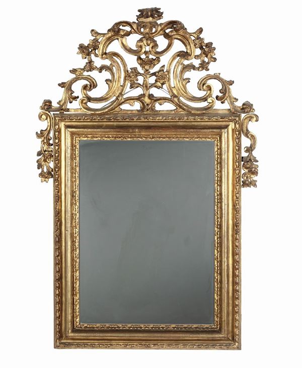 Grande specchiera in legno intagliato e dorato, XVIII-XIX secolo