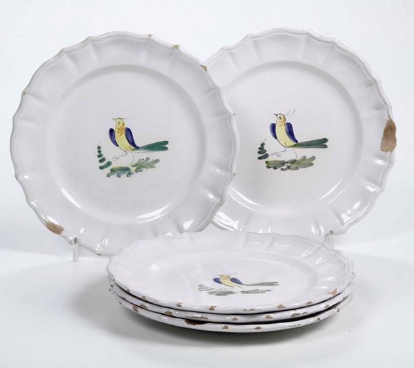 Quindici piatti decorati con uccellino Italia del nord, XX secolo
