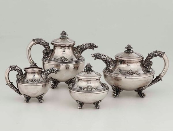 Servizio da tè composto da quattro pezzi. Argenteria milanese del XX secolo