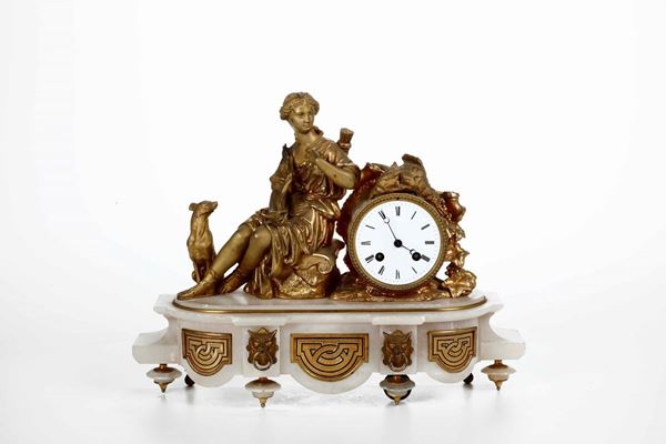 Pendola da tavolo in bronzo dorato e marmo. XX secolo
