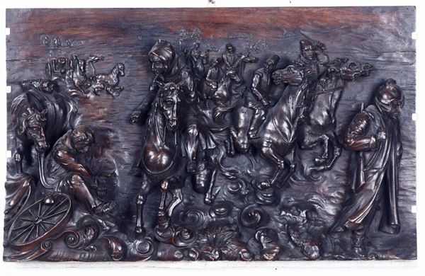 Bassorilievo in legno raffigurante soldati a cavallo