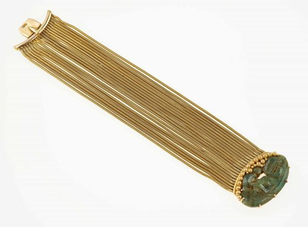 Gold and carved jade bracelet