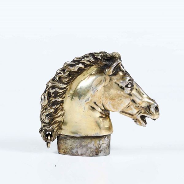 Testa di cavallo in metallo dorato