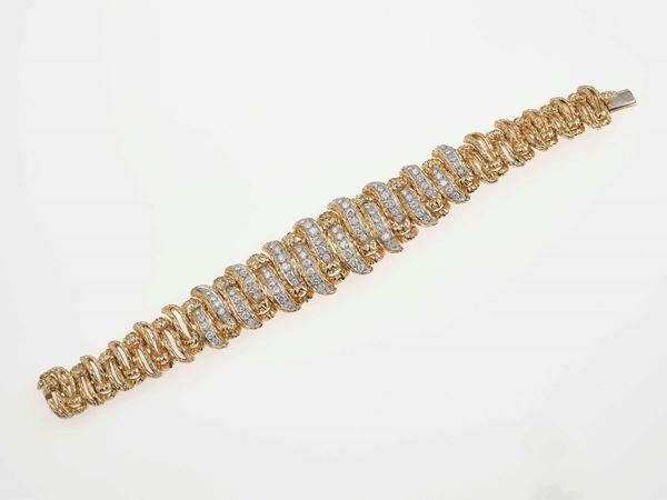 Diamond and gold bracelet. Signed Tiffany & Co.