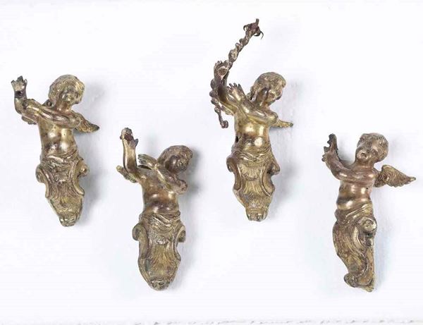 Quattro angioletti in bronzo dorato. Fonditore del XVIII-XIX secolo