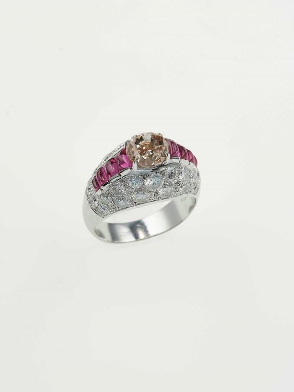 Diamond, ruby and platinum ring. Signed Bulgari