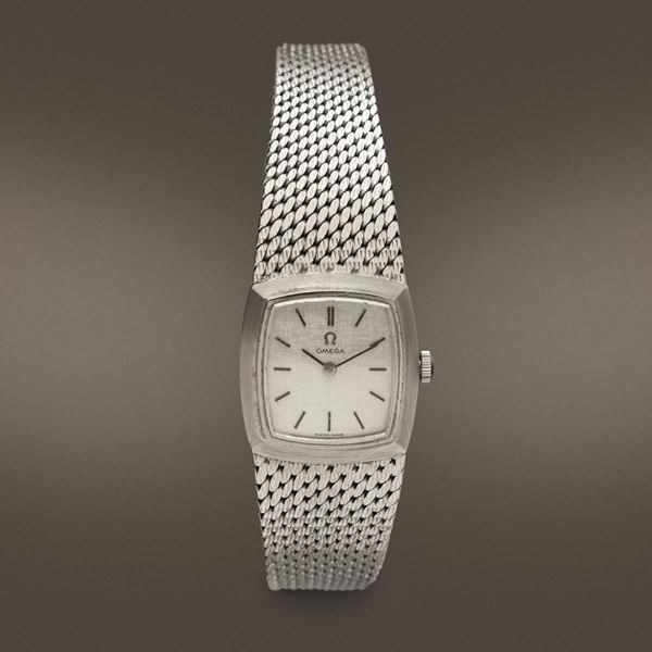 OMEGA - Elegante orologio da donna in oro bianco 18k con bracciale integrato a carica manuale