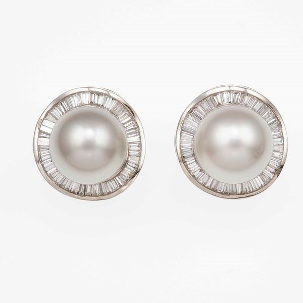 Pair of cultured pearl, diamond and low karat gold earrings