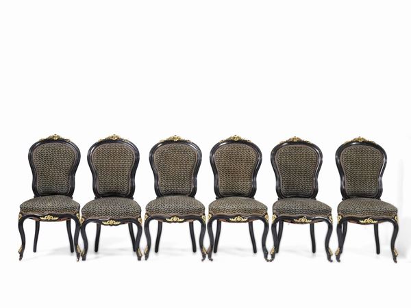 Gruppo di sei sedie in legno ebanizzato con fregi in bronzo dorato. Francia 1870 ca., attribuite a Léon Marcotte & Co.