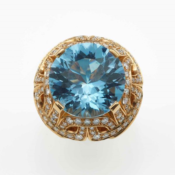 Modello Afrodite. Anello con topazio azzurro e diamanti per ct 1.86