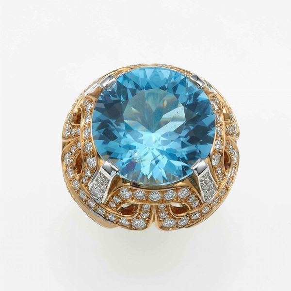 Modello Afrodite. Anello con topazio azzurro e diamanti per ct 2.56