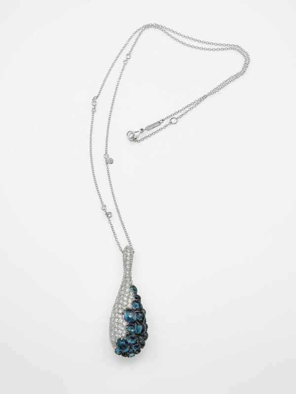 London blue topaz and diamond pendant necklace
