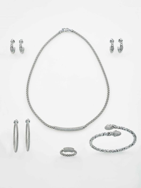 Group of three pairs of earrings, one ring, one necklace and one bangle bracelet