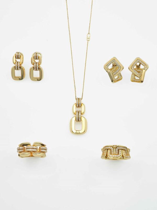 Group of four rings, three pairs of earrings and a pendent