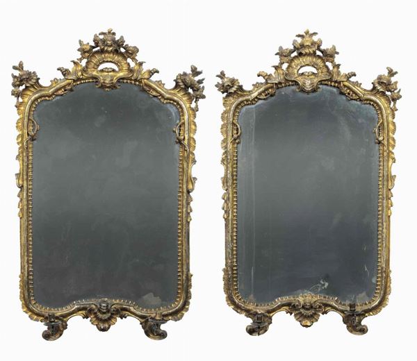 Coppia di specchiere in legno intagliato e dorato. Napoli, XVIII secolo