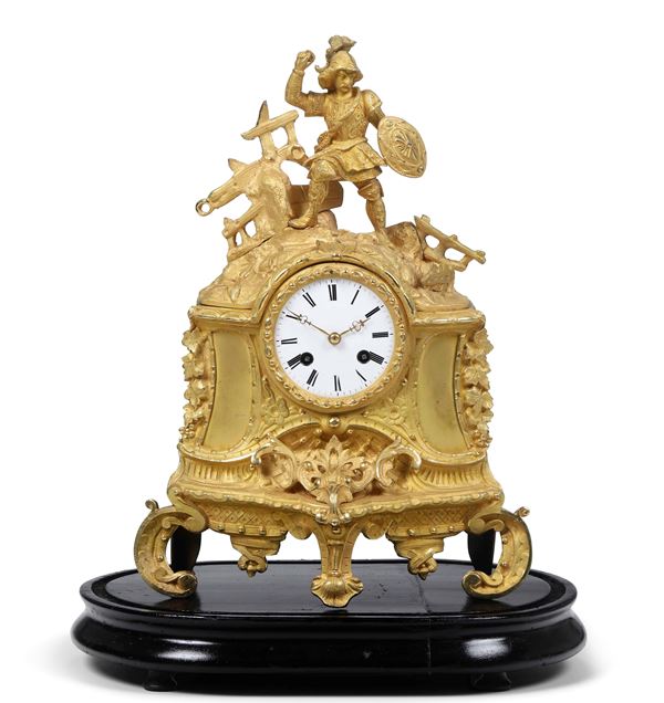 Orologio in bronzo dorato. XIX secolo