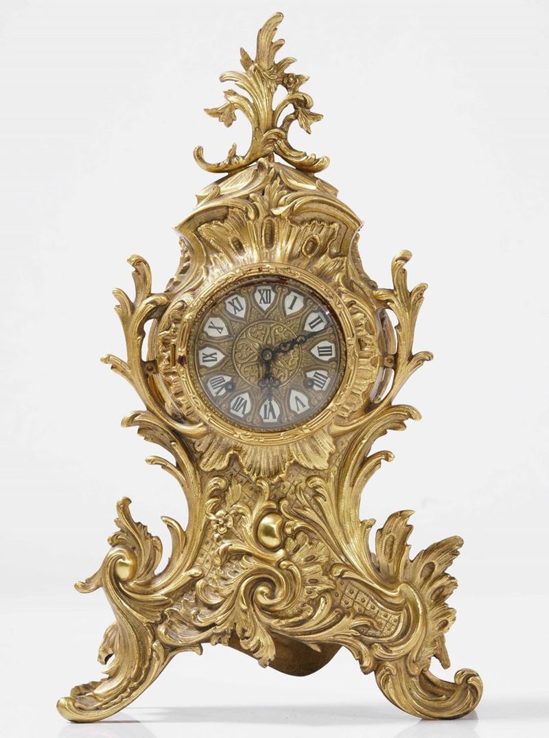 Orologio da appoggio in bronzo dorato, XIX-XX secolo  - Asta Antiquariato Giugno  [..]