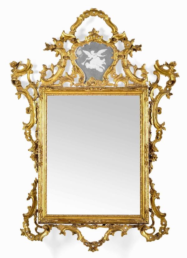 Specchiera Luigi XIV in legno intagliato e dorato. Veneto, XVIII secolo