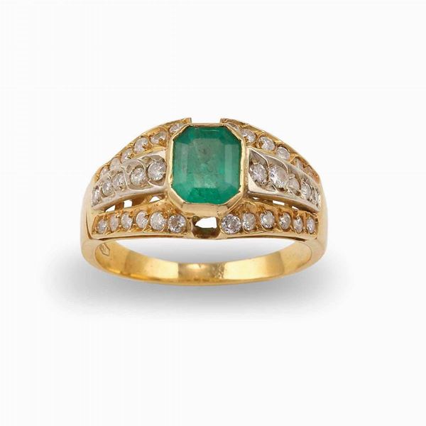 Anello con smeraldo Brasile di ct 0.60 circa e diamanti