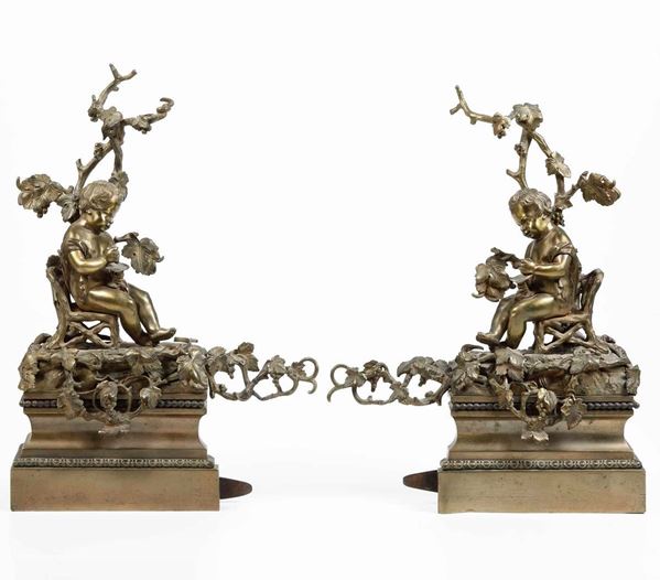 Coppia di alari in bronzo dorato. XVIII-XIX secolo