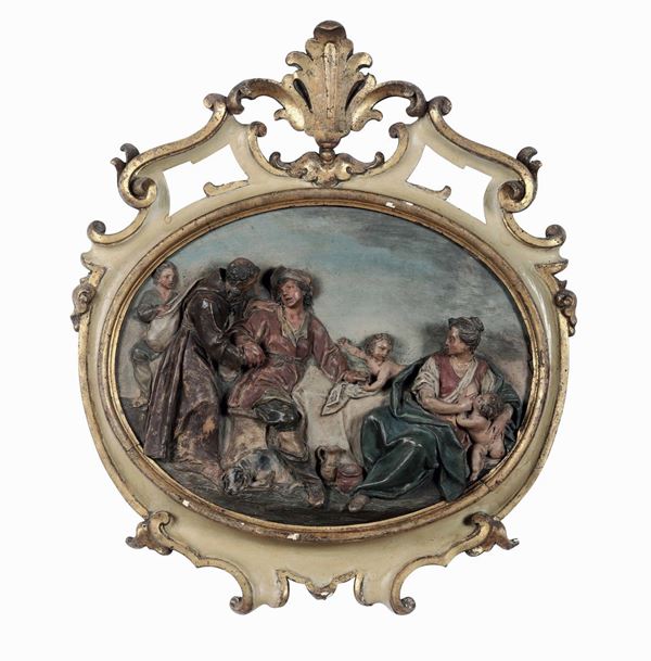 Serie di quattro placche ovali in terracotta a rilievo dipinta con scene bucoliche. Bologna XVIII secolo