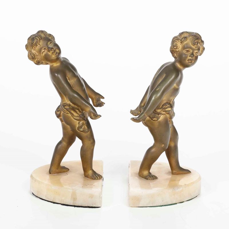 Due putti reggilibro in bronzo dorato. XIX secolo  - Auction Sculptures | Cambi Time - Cambi Casa d'Aste